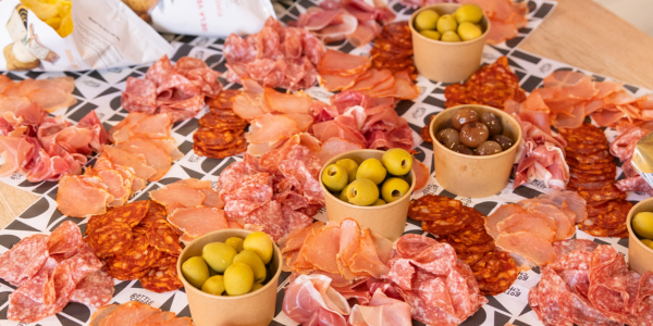 meat and olives on a table