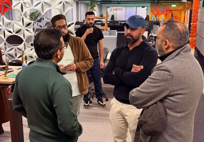 men discussing things in a ciricle