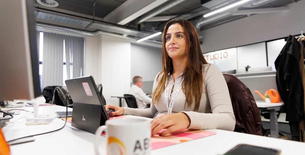 abstract-group-mia-at-desk