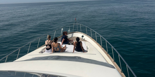 Group of people sat on a boat
