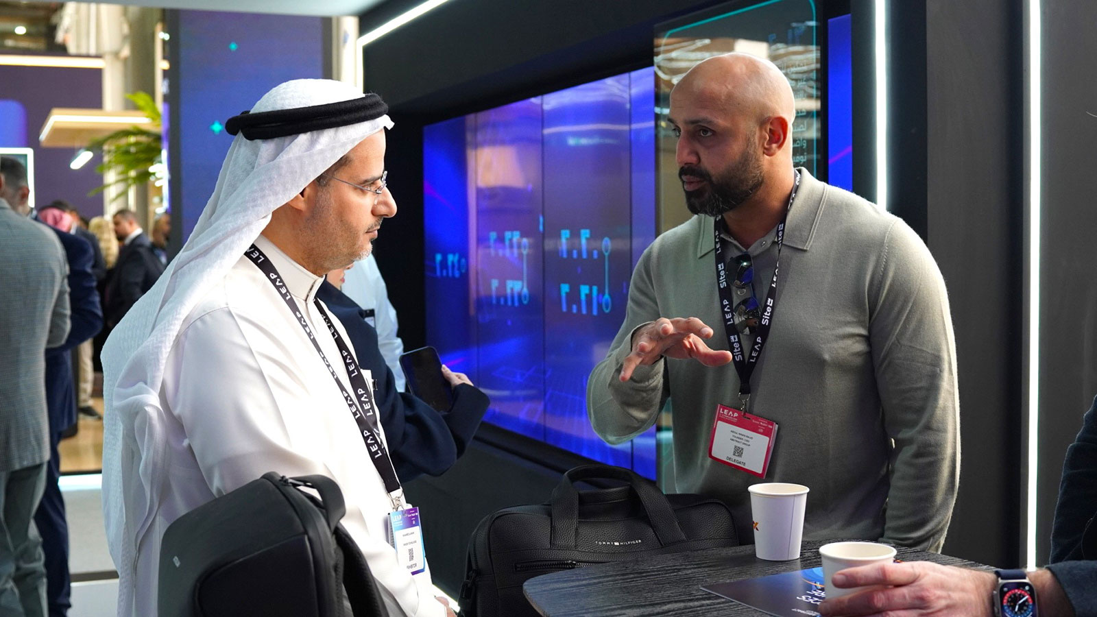 Minan Majid, CEO of Abstract Group, in conversation with a fellow delegate at the LEAP technology conference in Saudi Arabia